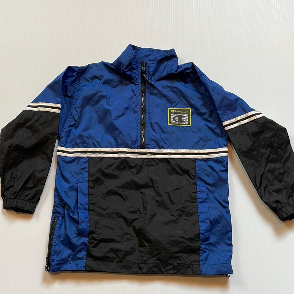 Champion blue and black quarter zip pull over. Side zippers. Boys size small